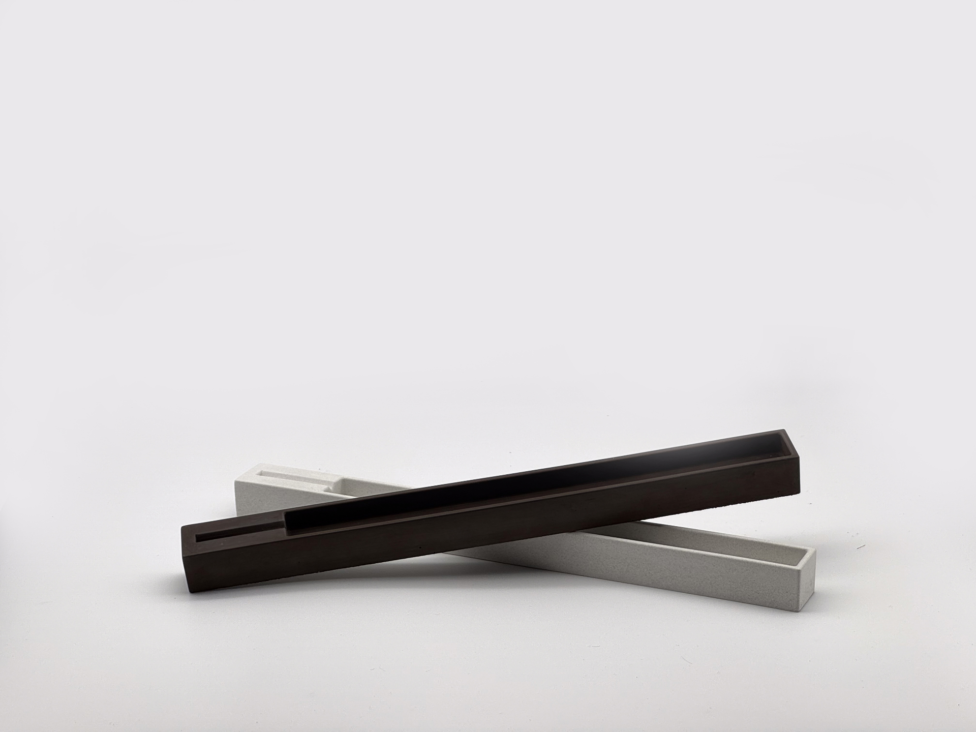 Linea — concrete linear incense holder, two colorways